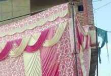 गाजियाबाद में शराब की दुकानों पर लगा पर्दा